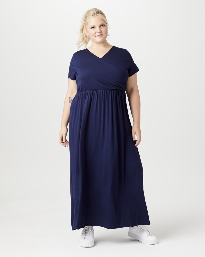 Plus size model with apple body shape wearing Carnation Wrap Maxi Dress by Meri Skye | Dia&Co | dia_product_style_image_id:158636